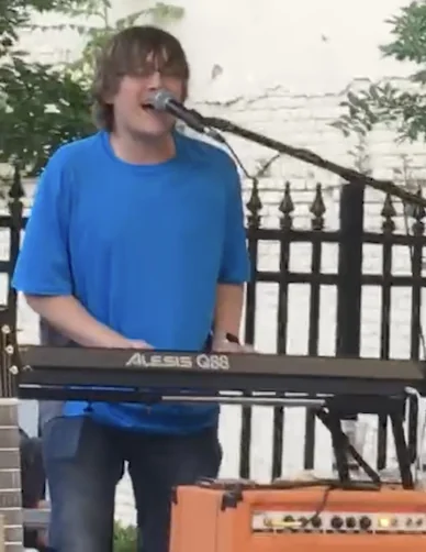 Beau Christ performing on keyboard at FR8Yard