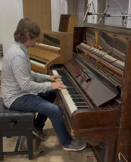 Beau Christ playing Mrs Mills piano